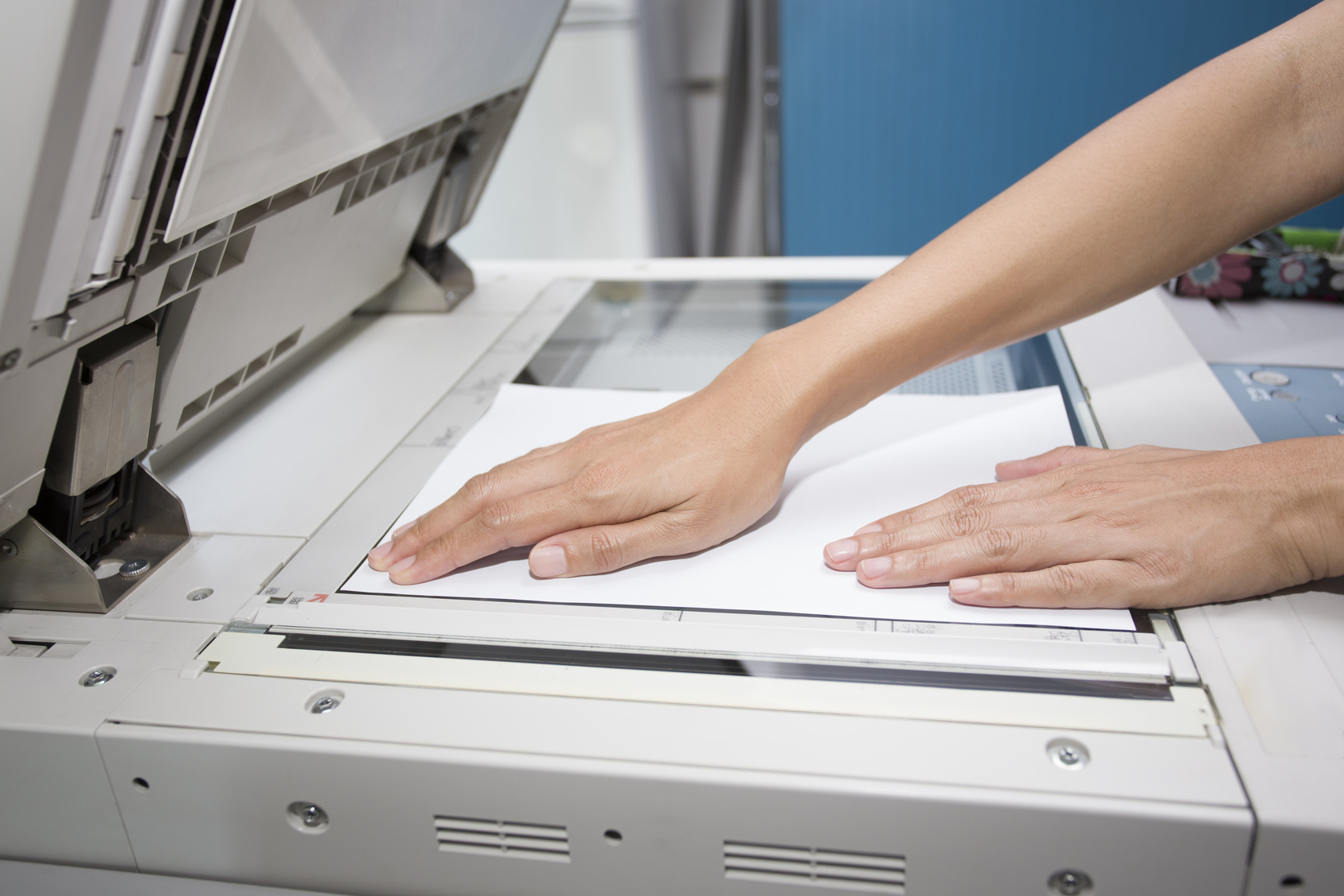 What are the advantages and disadvantages of a photocopier?